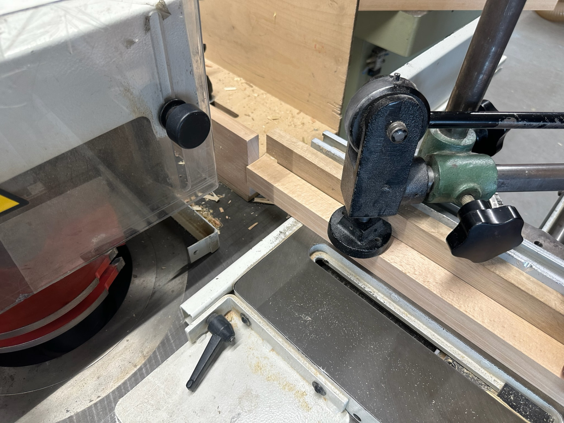 Set-up on the panel saw with a stop and clamp fixed to the fence.