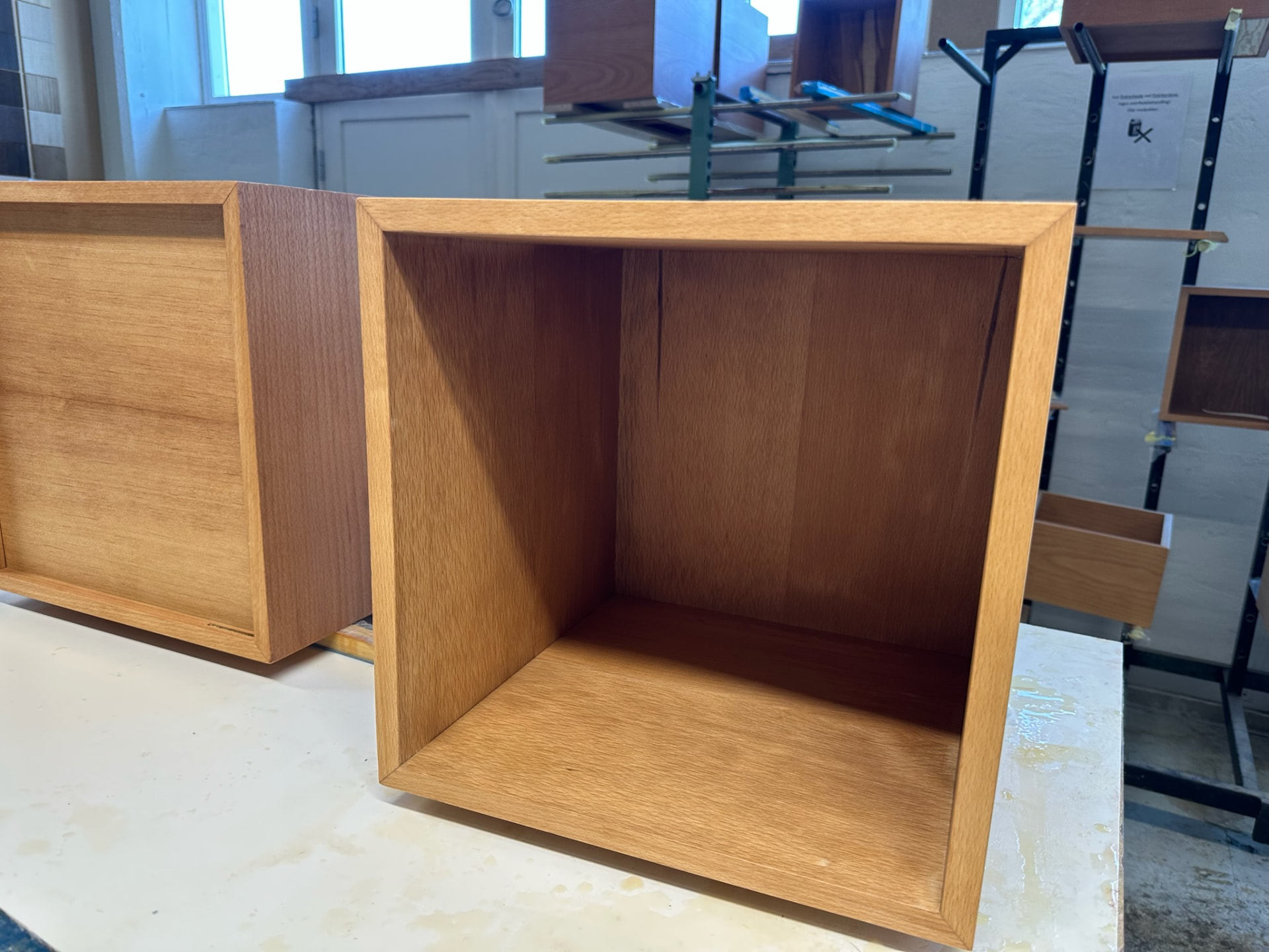 Two oak carcasses standing on the bench after glue-up.