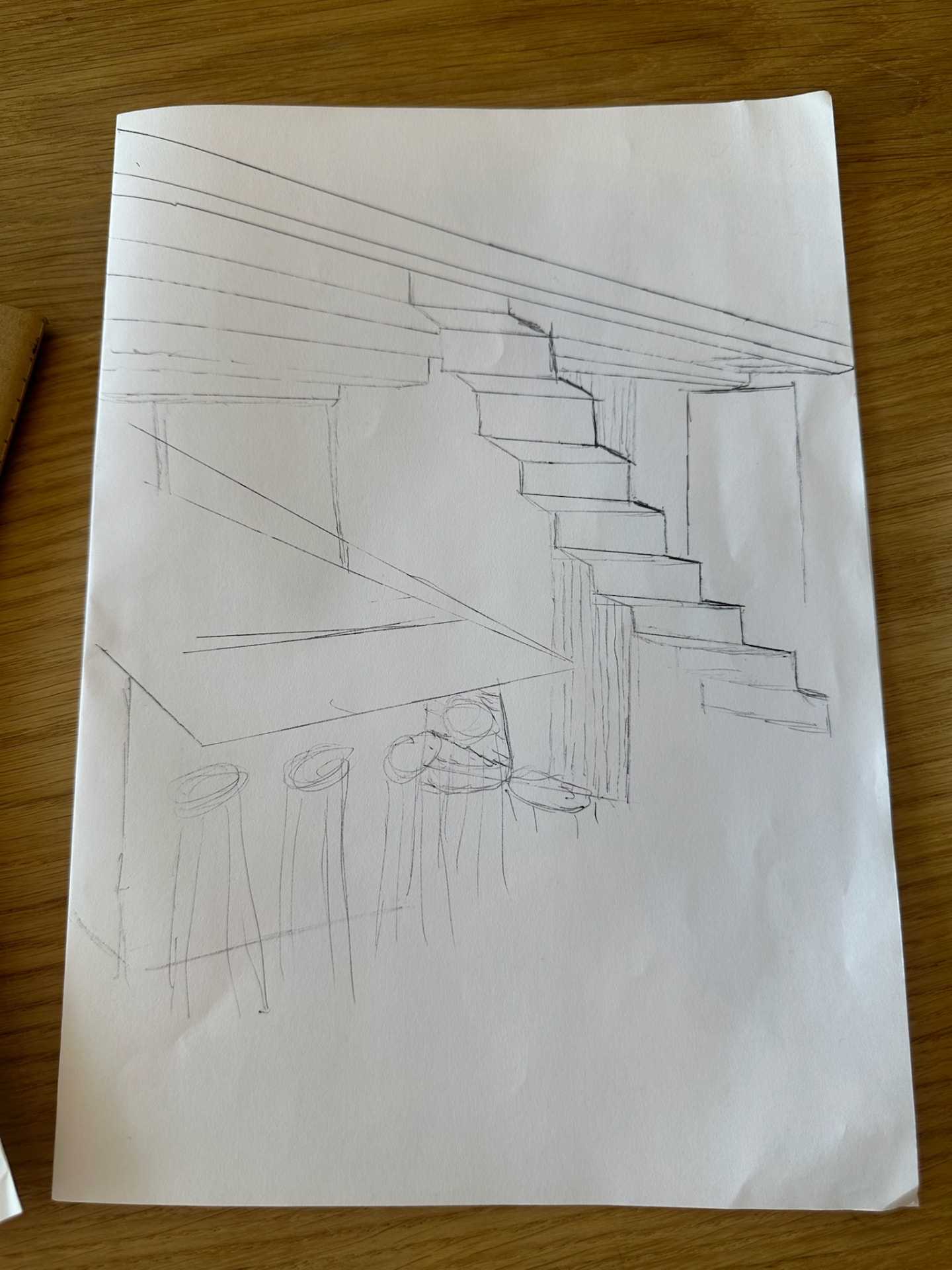 Pencil perspective sketch of a staircase, counter and bar stools.